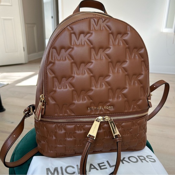 Michael Kors Handbags - Michael Kors Rhea Backpack, Brown/Gold Embossed